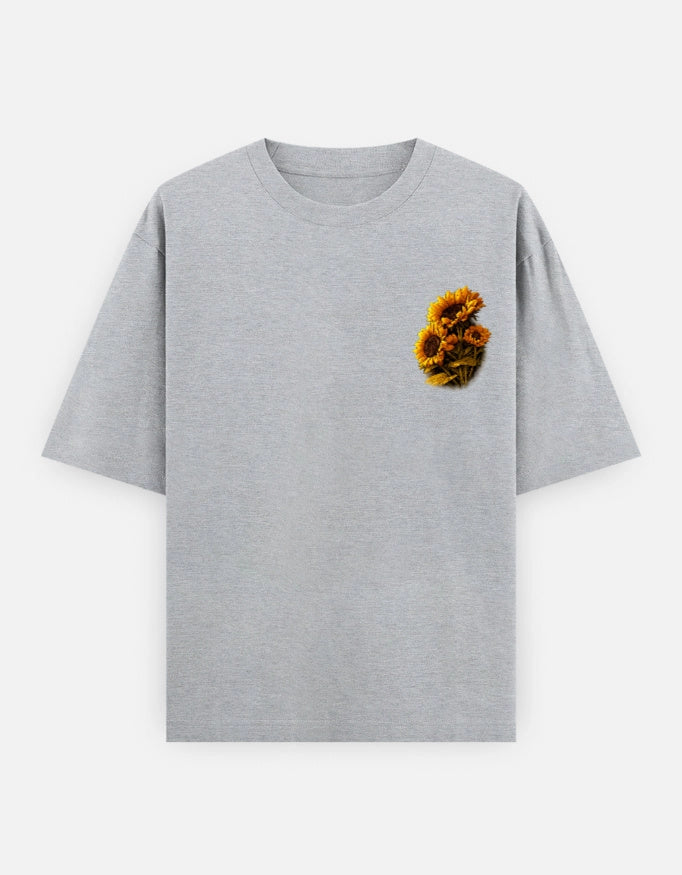 Front view of The Unserious Oversized Unisex Tee in Sunflower Edition, featuring a bold sunflower graphic on a casual tee.