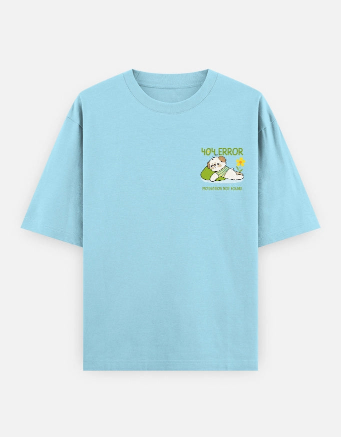 Unisex oversized T-shirt by The Unserious Studio with "404 Motivation Not Found" slogan on the front, casual streetwear style.