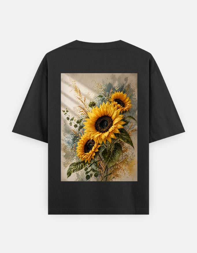 Back view of The Unserious Studio oversized unisex tee with "Heal. Bloom. Glow" printed on the back, casual and relaxed fit.