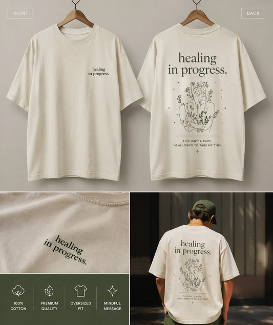 Unisex oversized tee from The Unserious Studio with "Healing in Progress" text, shown laid flat with a relaxed fit.