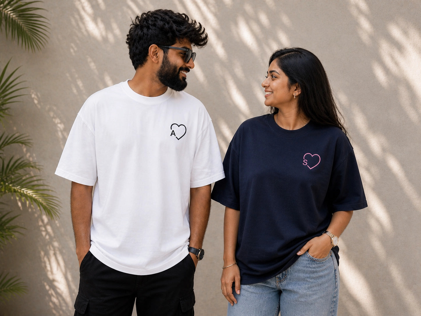 Two oversized unisex couple T-shirts from The Unserious Studio with "If Lost return to Babe" and "I am Babe" printed designs.