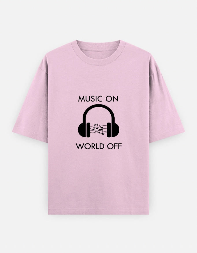 Unisex oversized tee by The Unserious Studio with "Music on, World Off" graphic on the front, casual fit, and relaxed style.