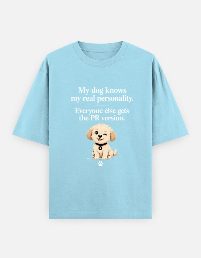 Unisex oversized T-shirt by The Unserious Studio featuring a playful design and casual fit, perfect for dog lovers and casual wear.