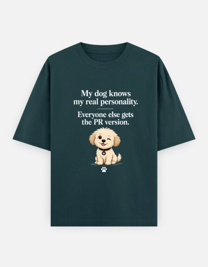 Unisex oversized T-shirt from The Unserious Studio featuring a front graphic that reads "My Dog Knows My Real Personality."