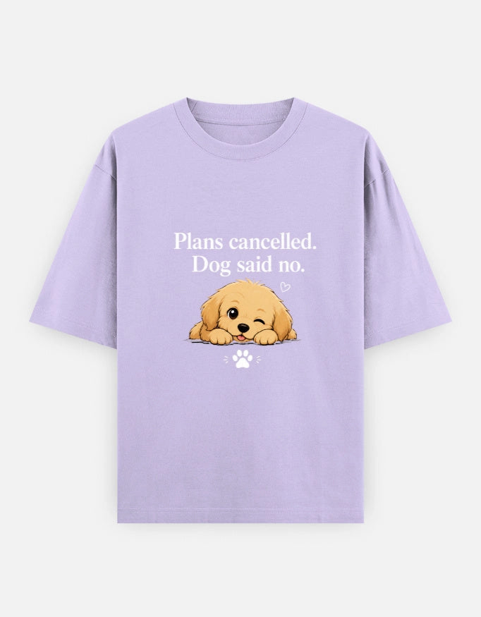 Lavender oversized unisex tee featuring a dog illustration with "Plans Cancelled" text, from The Unserious Studio.