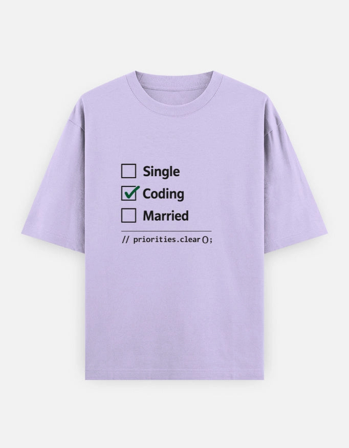 Unisex oversized tee by The Unserious Studio featuring a front design with bold "Coding > Everything" text on soft fabric.