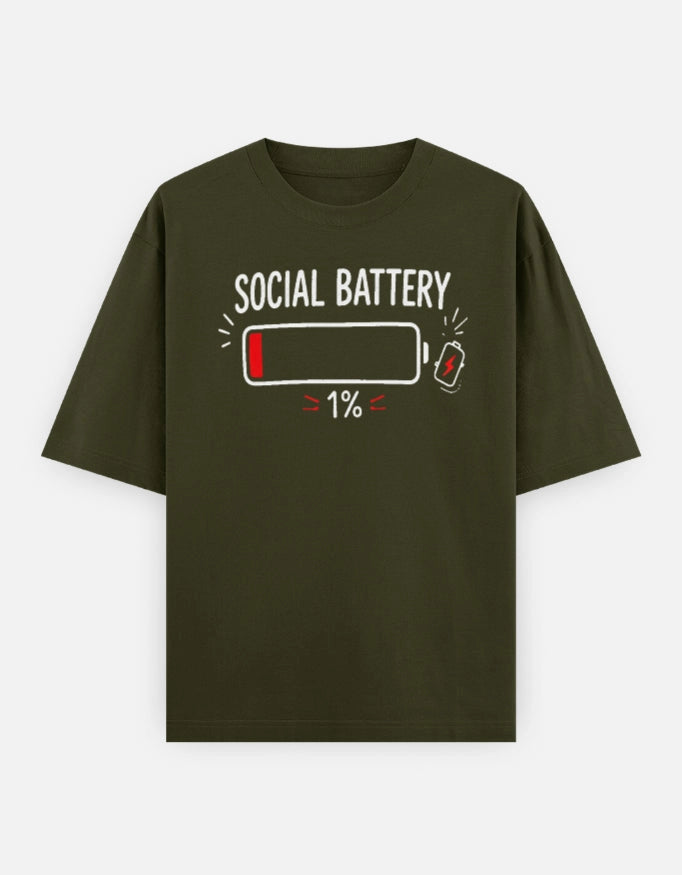 Front view of The Unserious Studio Oversized Unisex Tee featuring the "Social Battery 1%" graphic in black on a white cotton t-shirt.