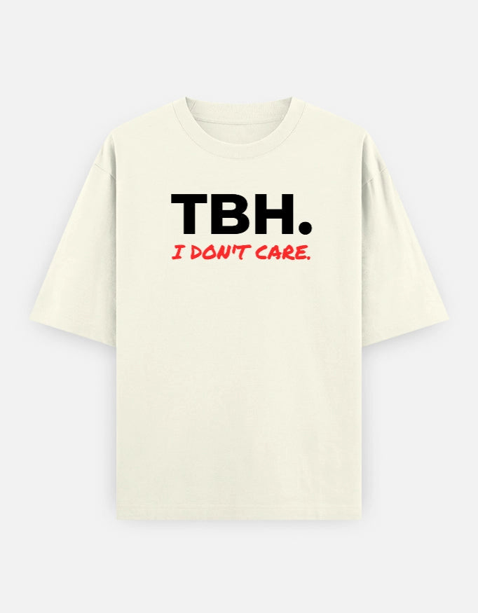 Unisex oversized tee from The Unserious Studio with "TBH Unbothered" graphic, casual fit, and comfortable fabric in neutral tones.