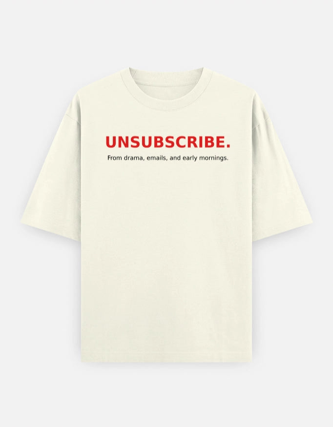 Unisex oversized tee from The Unserious Studio featuring the "Unsubscribe from Office Drama" print, casual fit and soft fabric.