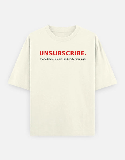 Unisex oversized tee from The Unserious Studio featuring the "Unsubscribe from Office Drama" print, casual fit and soft fabric.